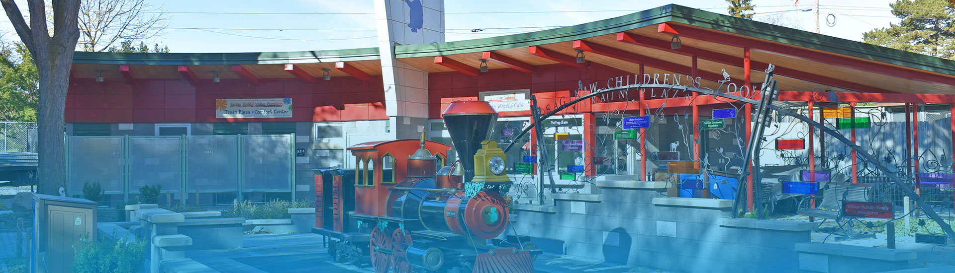 Train Whistle Cafe with Model Train in front