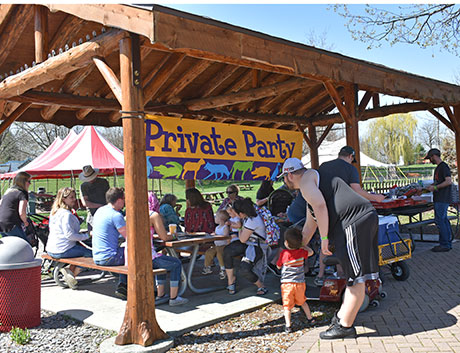People gathered for a birthday party at the zoo birthday party pavilion